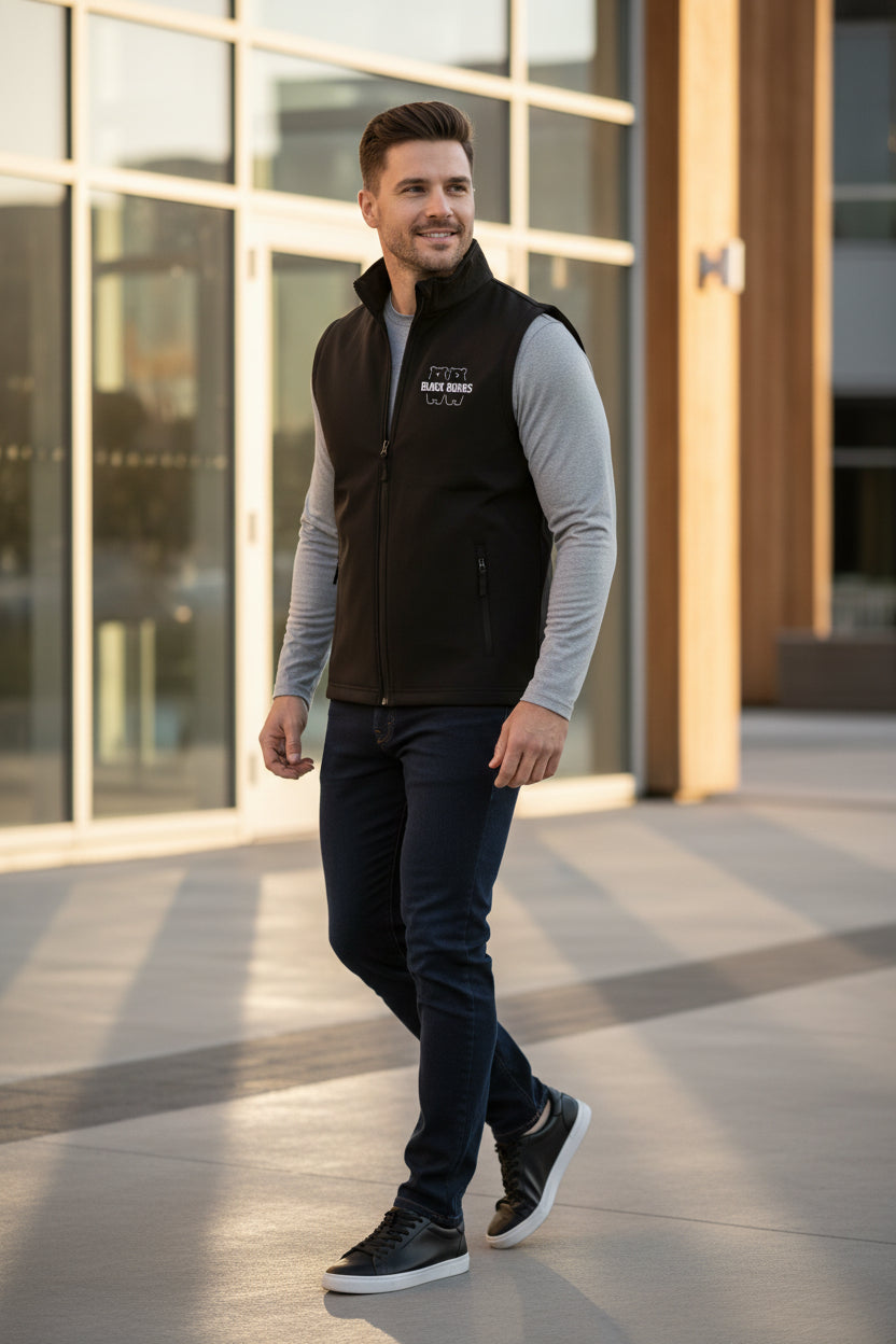 Man wearing Black softshell gilet with 'Black Bears' logo on it can be printed with your own logo