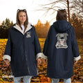 woman wearing personalised dog walking robe coat printed with dog business logo